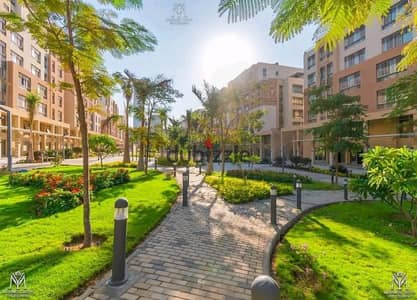 Apartment for sale, shot at the old price, in the tourist walkway in Al-Maqsad Compound, New Administrative Capital