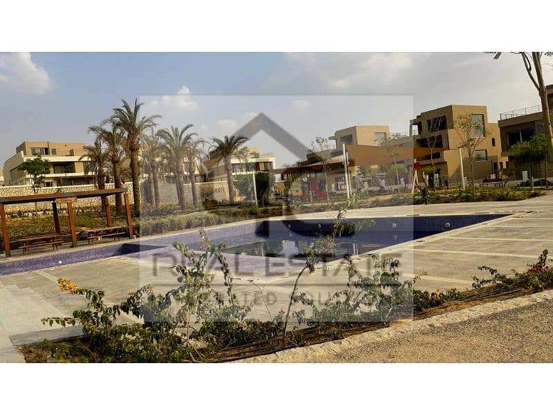 Townhouse Corner for sale with price including maintenance  in the heart of New Cairo with the lowest down payment and installments 12