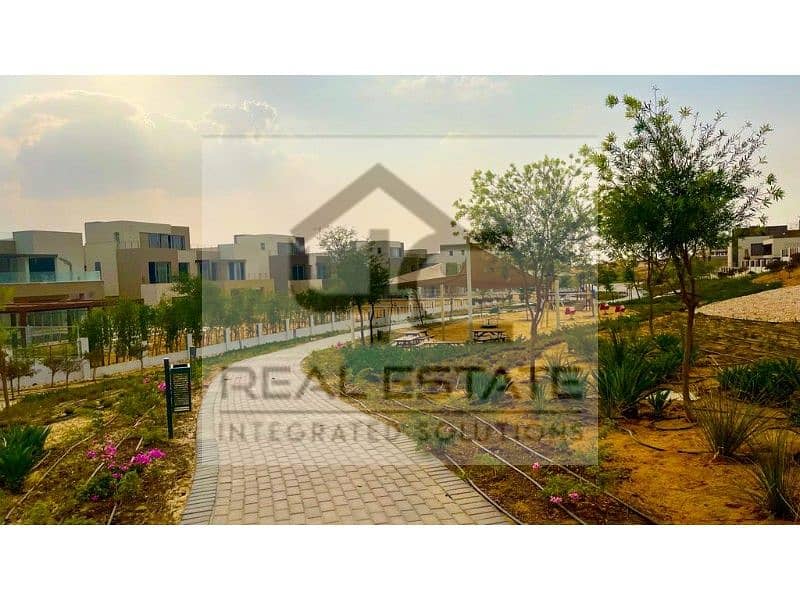 Townhouse Corner for sale with price including maintenance  in the heart of New Cairo with the lowest down payment and installments 13