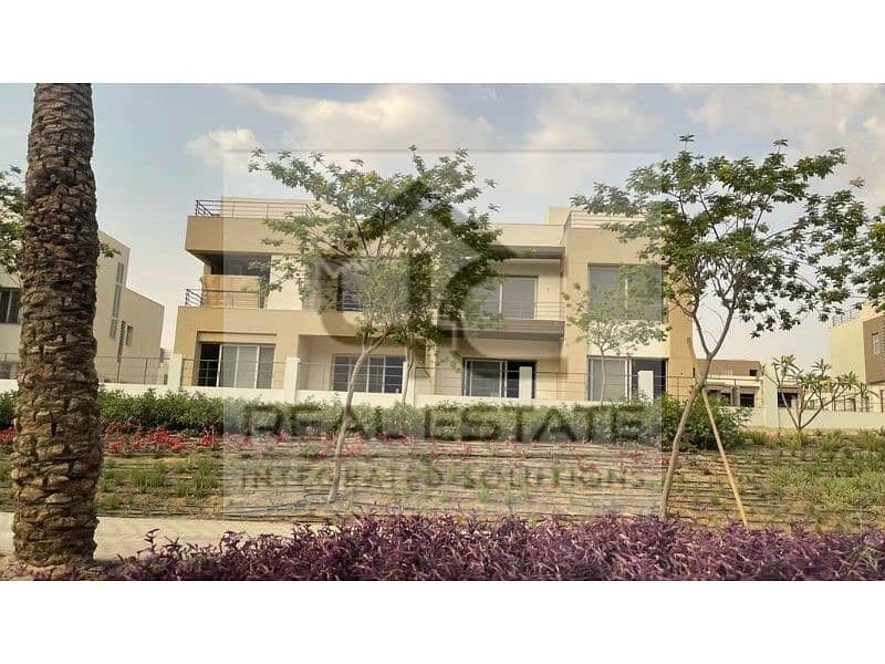 Townhouse Corner for sale with price including maintenance  in the heart of New Cairo with the lowest down payment and installments 14