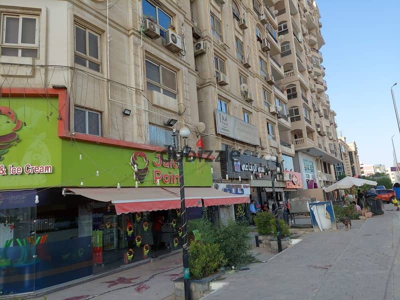 A store in Al-Zahraa, next to Spinneys, Karam Al-Sham, Bel Laban, and Dunkin Donuts, on a main street, the strongest and most distinguished street in 2