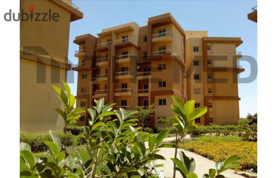 Large apartment with garden in Ashgar City Compound, for sale in October, semi-finished, ready to move, in hadayk October , near Al Fardous, O West 4