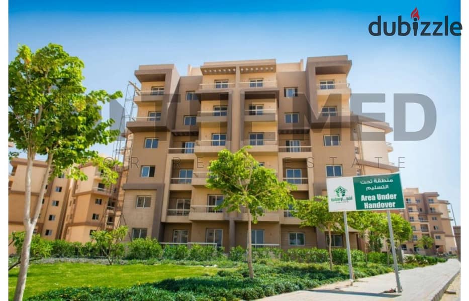 Large apartment with garden in Ashgar City Compound, for sale in October, semi-finished, ready to move, in hadayk October , near Al Fardous, O West 6