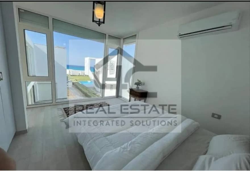 With a down payment 627,550, own a fully finished chalet steps from the sea. with the lowest total in Marbay 2