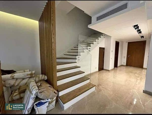 Independent villa for sale with a 42% cash discount or installments over 7 years, directly on Suez Road, next to Madinaty 6