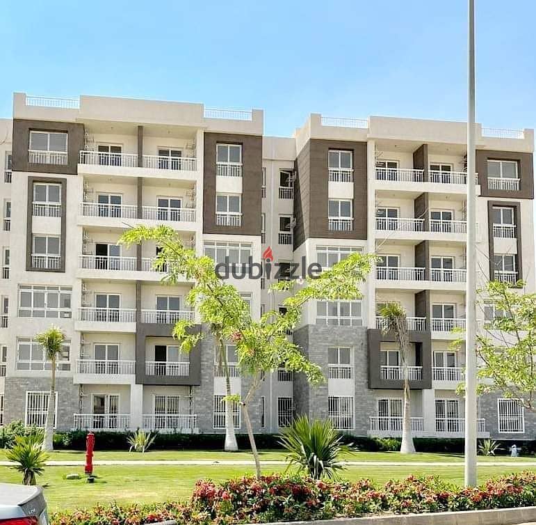 A catch apartment for sale in b14 at Madinaty city , with old price and amazing total price , high distinct L010 , sea front , wide garden view 5