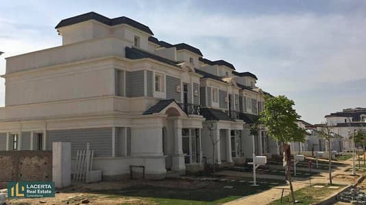 Townhouse corner in 6 October with 15% down payment and installment 9 years only in Kingsway Mountain View near Chillout Park and  Icity Compound