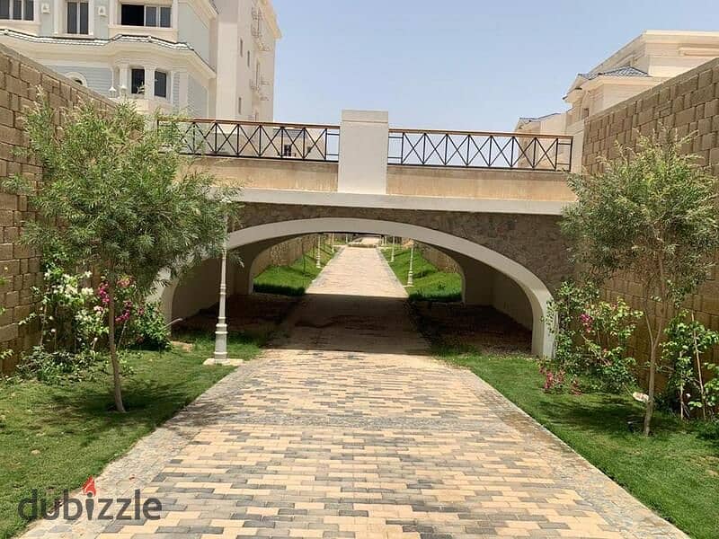 Live in Mountain View Sheikh Zayed in installments, an apartment with a distinctive view behind Mall of Arabia in installments 2