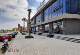 Shop For Rent In Palm Hills, directly on the axis of The Ellen Mall  In front of Arkan Plaza Vital and commercial mall 0