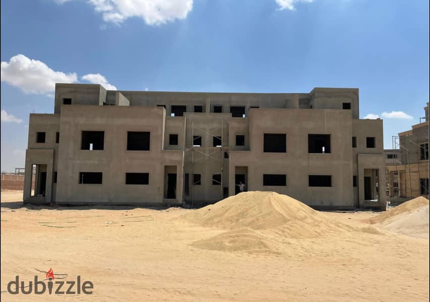 Own a villa in installments over 9 years, in a prime location in Sheikh Zayed, next to EMMAR 14