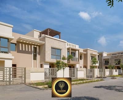 Quattro villa for sale in Taj City Compound in the New Settlement next to Swan Lake Hassan Allam