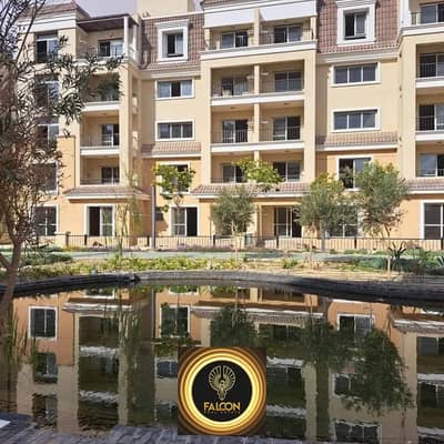 For sale, a huge apartment with a garden, for cash, 42% + installments, in the most distinguished location in New Cairo, next to Madinaty, in Sarai Co