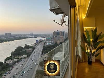 A luxury hotel apartment for sale with the most beautiful view in Egypt, directly on the Nile, RTM with furnishings and the latest appliances