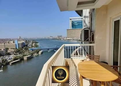 Apartment with hotel finishing, Ac , furnished, on the Nile, in installments