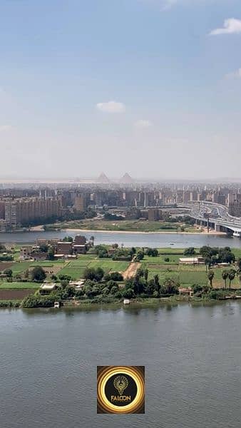 Double View Nile and Pyramids fully furnished hotel apartment next to Hilton Maadi