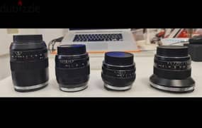 4 zeiss EF mount lenses 18.28. 50.100 0