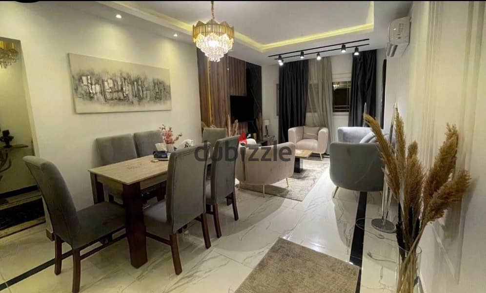 Apartment for sale in La Capitale Compound with air conditioning and kitchen 1