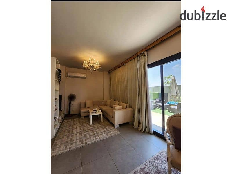 Apartment for sale, 4 rooms, fully finished, in Garnet Compound, Fifth Settlement, with AUC Direct View 1