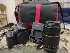 canon 1200 d with lens 55-250 0