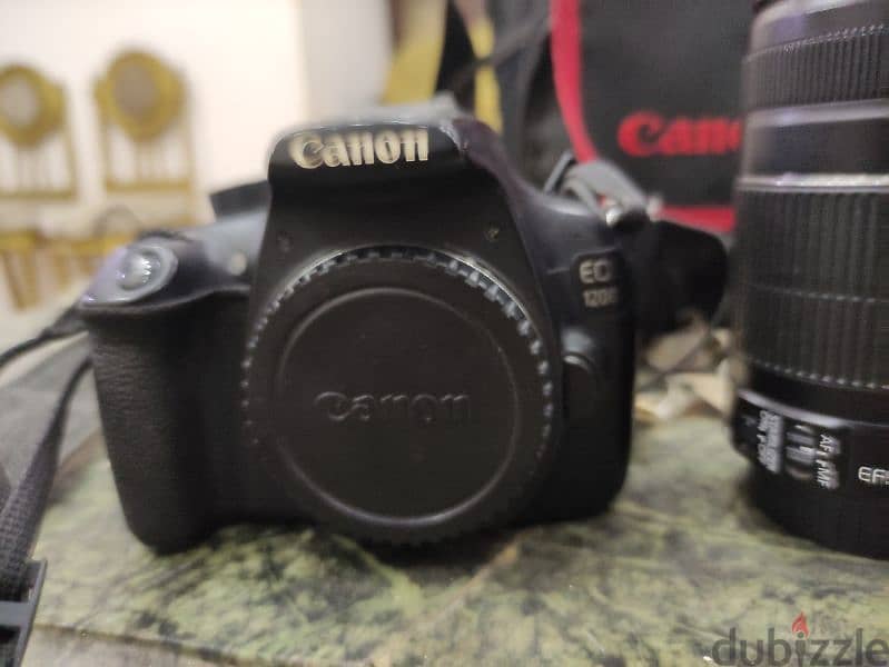 canon 1200 d with lens 55-250 5