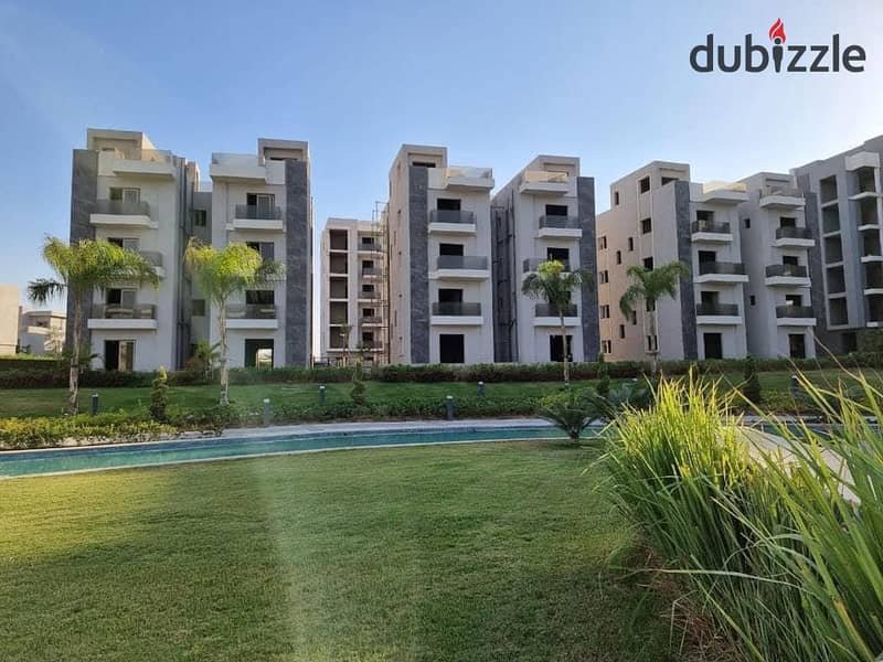 Live in a fully finished apartment in installments with a view of the pyramids in the tourist capital in SUN CAPITAL 0