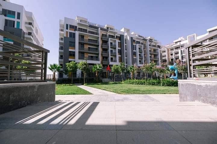 Apartment for sale 3BR with private garden, in The Icon Gardens Compound Next To AUC 1