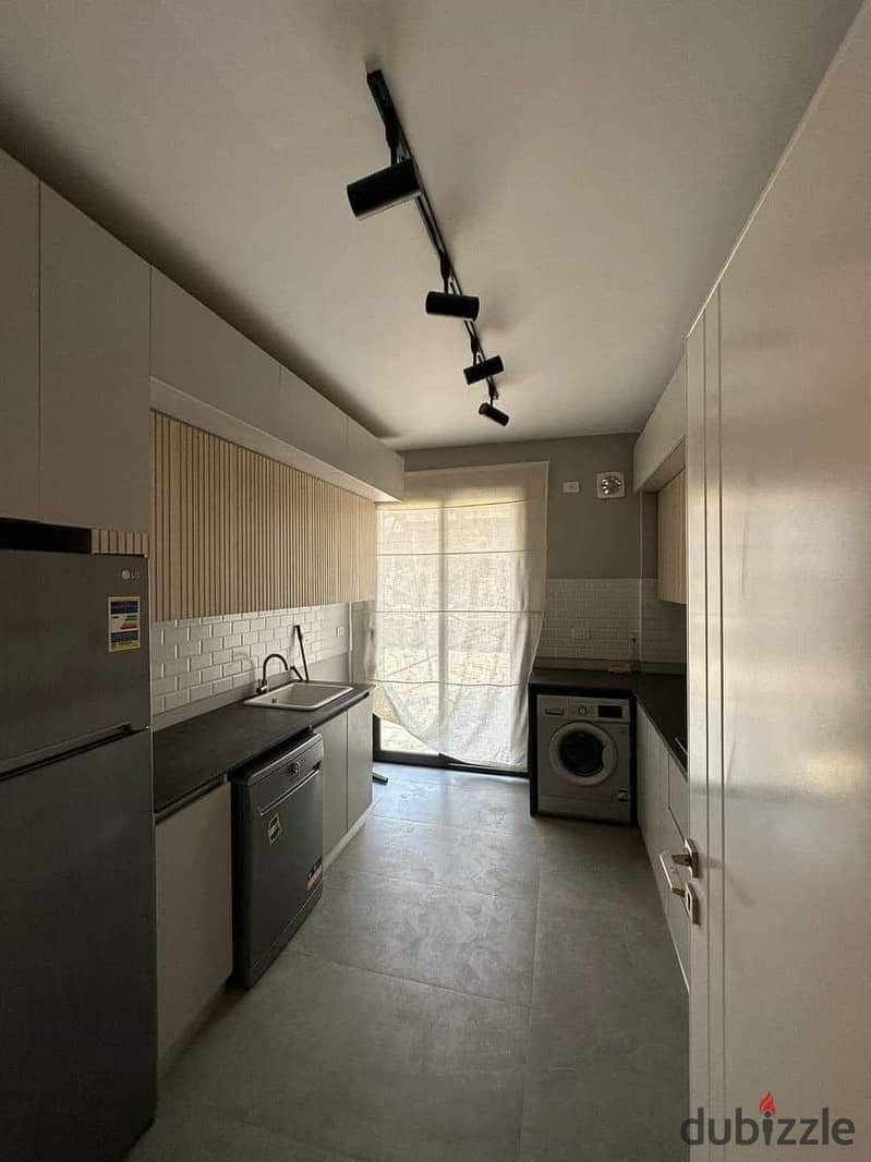 Apartment for sale, immediate receipt, finished, with air conditioners and kitchen, in the Capital Compound in the New Administrative Capital. 3