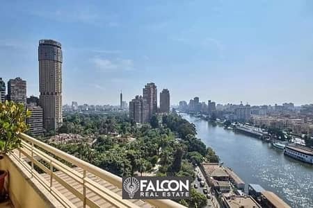 For sale, a 47 sqm hotel apartment in the Rive du Nile Towers, first row on the Nile, fully finished, with air conditioners, furnishings + appliances