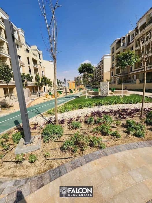 Apartment for sale in a garden (with a 42% cash discount + installments) in New Cairo next to Madinaty in the Sarai Compound 7