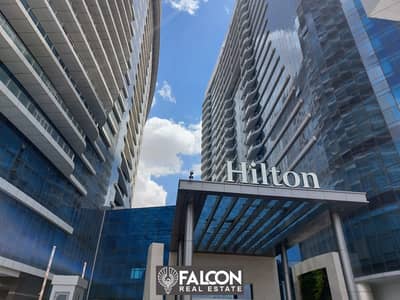 للبيع شقه فندقيه تطل علي النيل مباشره استلام فوري ومتشطبه بالكامل بجوار فندق هيلتون  (Service by Hilton)