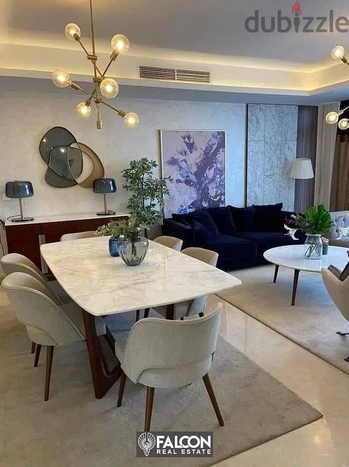 A luxurious apartment with a private garden, fully finished, immediate receipt, ready to move in El Patio 7 Compound - Fifth Settlement - New Cairo 10