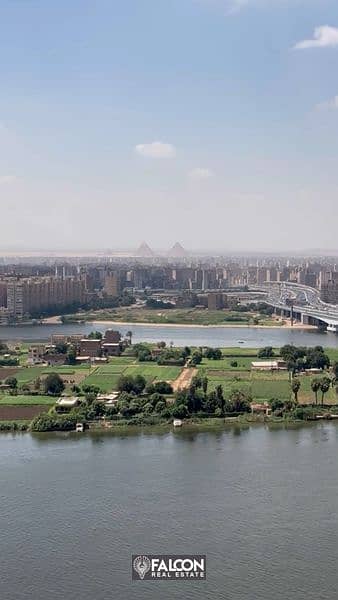 Double View Nile and Pyramids fully furnished hotel apartment next to Hilton Maadi