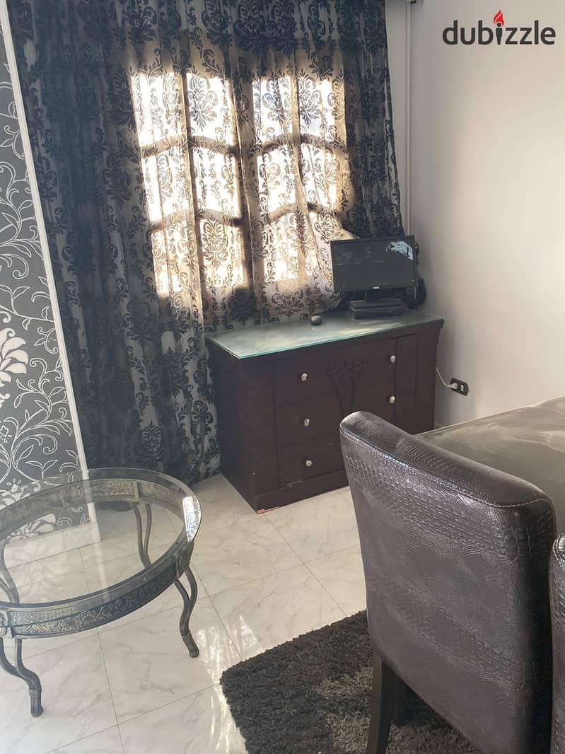 Furnished apartment for rent, ground floor + garden, fully air-conditioned, first residence in South Academy - Fifth Settlement 2