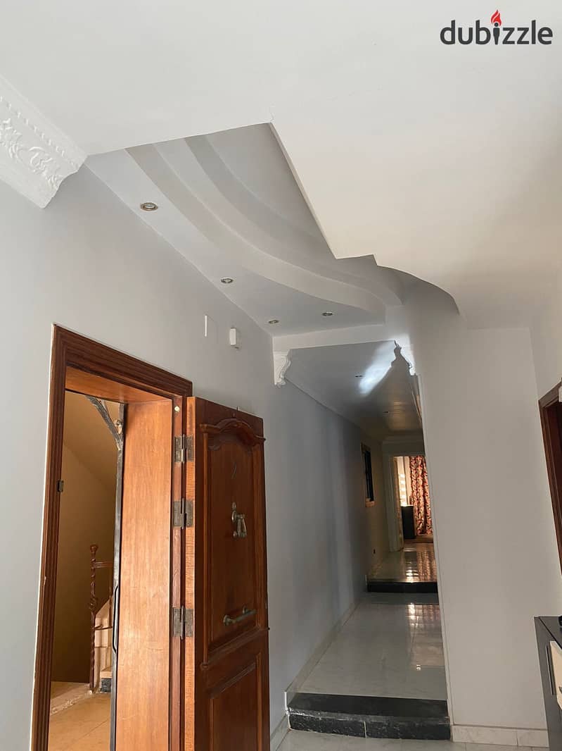 Furnished apartment for rent, ground floor + garden, fully air-conditioned, first residence in South Academy - Fifth Settlement 17