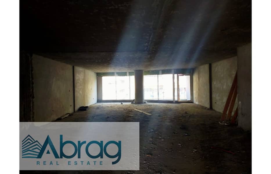 For sale, a commercial store, 295 meters, ground floor and first main Lebanon Street - Mohandiseen 2