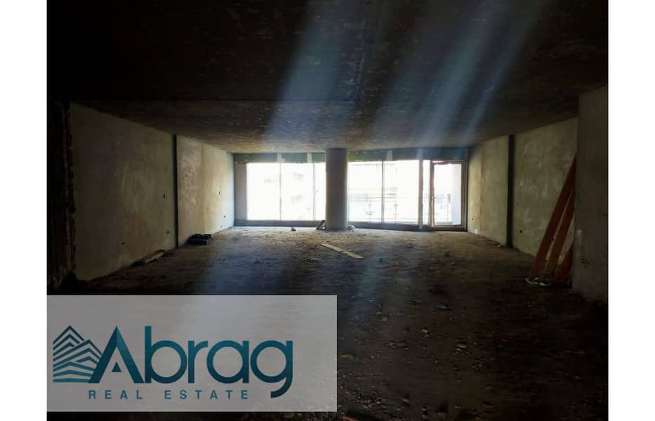 For sale, a commercial store, 295 meters, ground floor and first main Lebanon Street - Mohandiseen 4