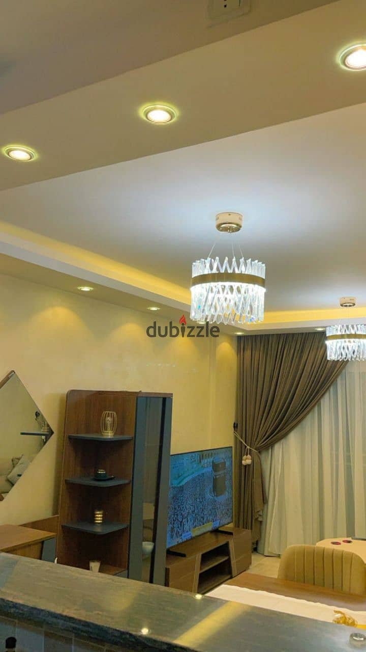 Furnished apartment for rent in Madinaty B12, 86 sqm, ground floor, 60 sqm garden, near the Craft Zone, the mosque, the medical center, and the East H 9