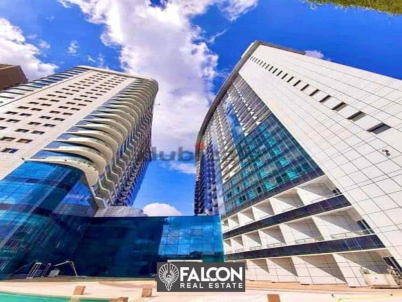 Own now a hotel apartment managed by Hilton ((immediate delivery)) with a direct view of the Nile and full hotel services, Nile Pearl Towers 10