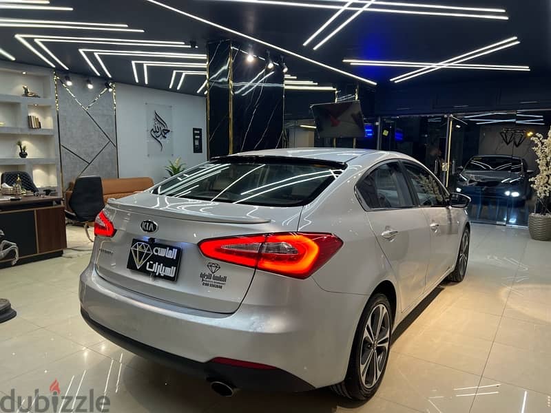 Kia Cerato 2015 فابريكة بره وجوه 3