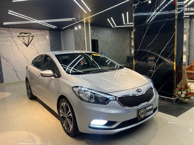 Kia Cerato 2015 فابريكة بره وجوه 4