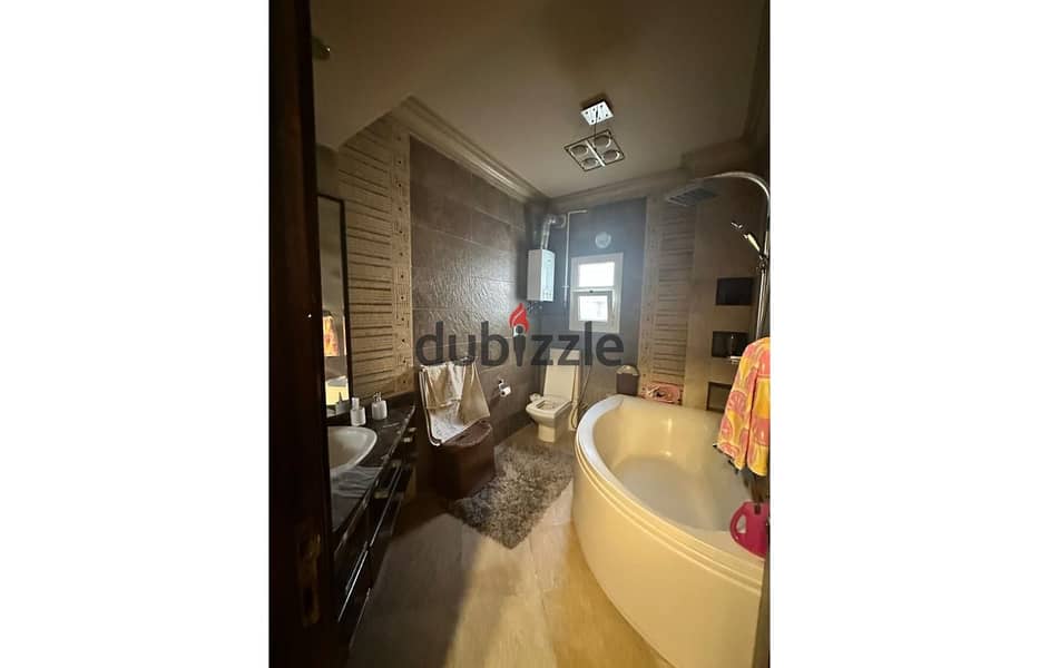 Apartment 400m semi furnished for sale in al shouyfat new cairo 7