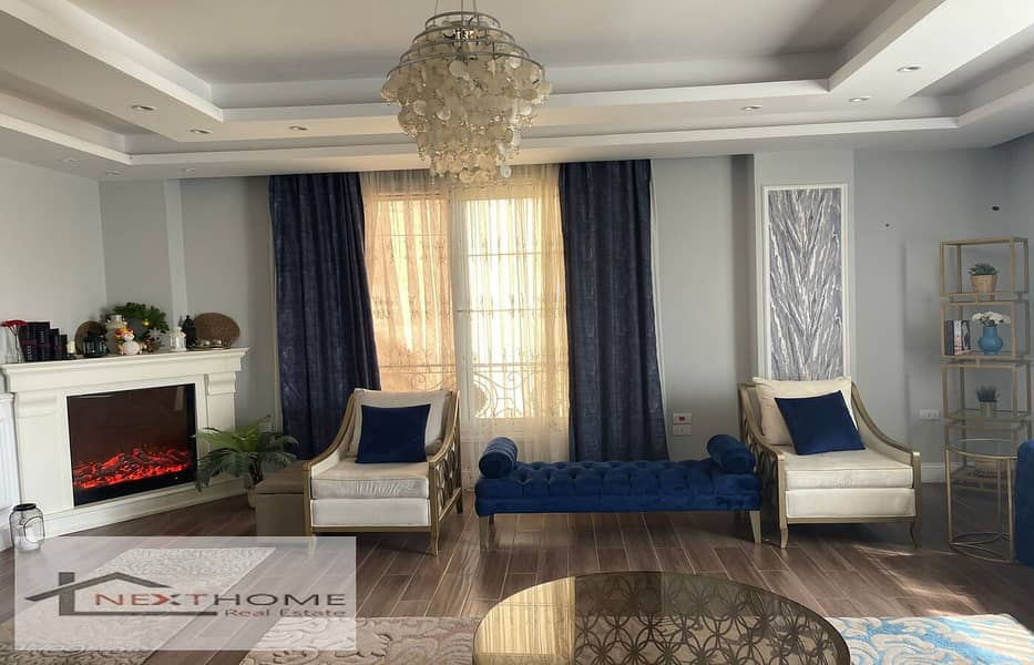 Apartment for sale in Trio Gardens Compound, super luxurious finishing, distinctive view 9