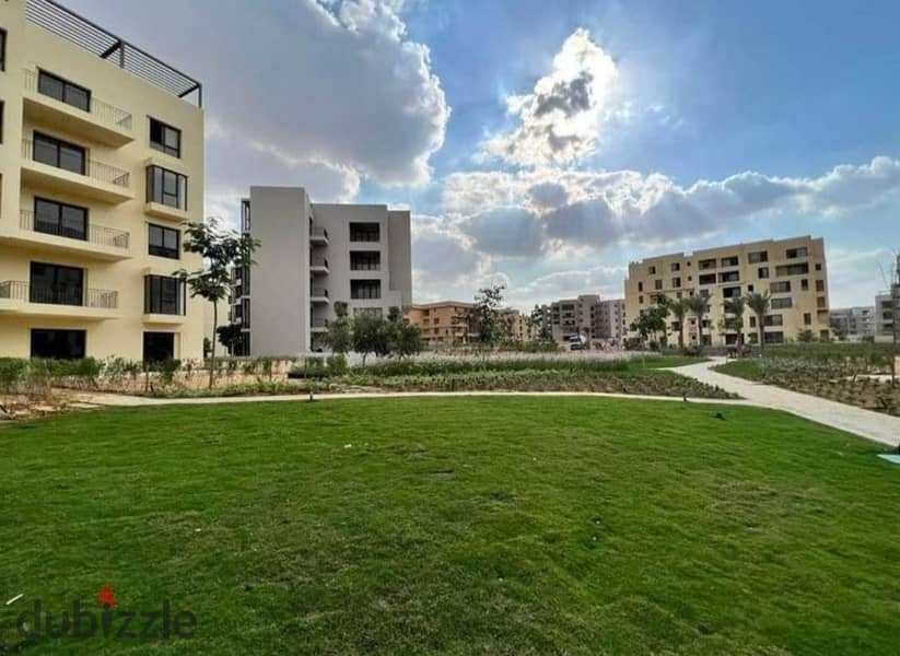 Garden Apartment , 930,000 DP & installments over 9 y, in o west compound at 6th of- October 7