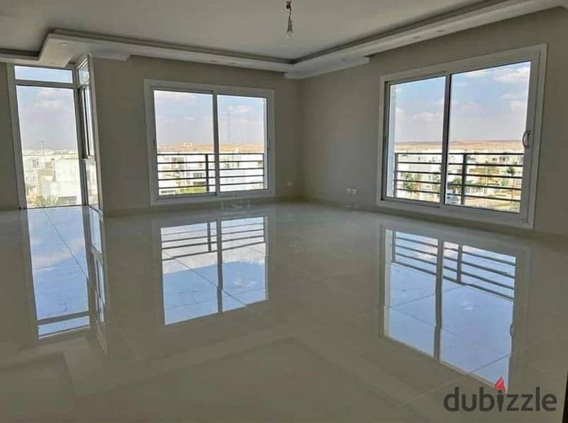 Prime location apartment with 4 rooms in Owest, available for installment over 9 years, directly across from Mall of Egypt. 30