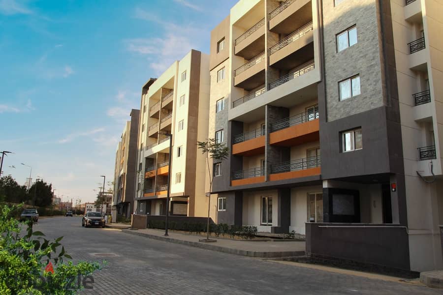 Apartment for sale in October with installments, fully finished in Rock Eden with a distinctive view of water bodies and landscape. . | Ashgar City - A 32