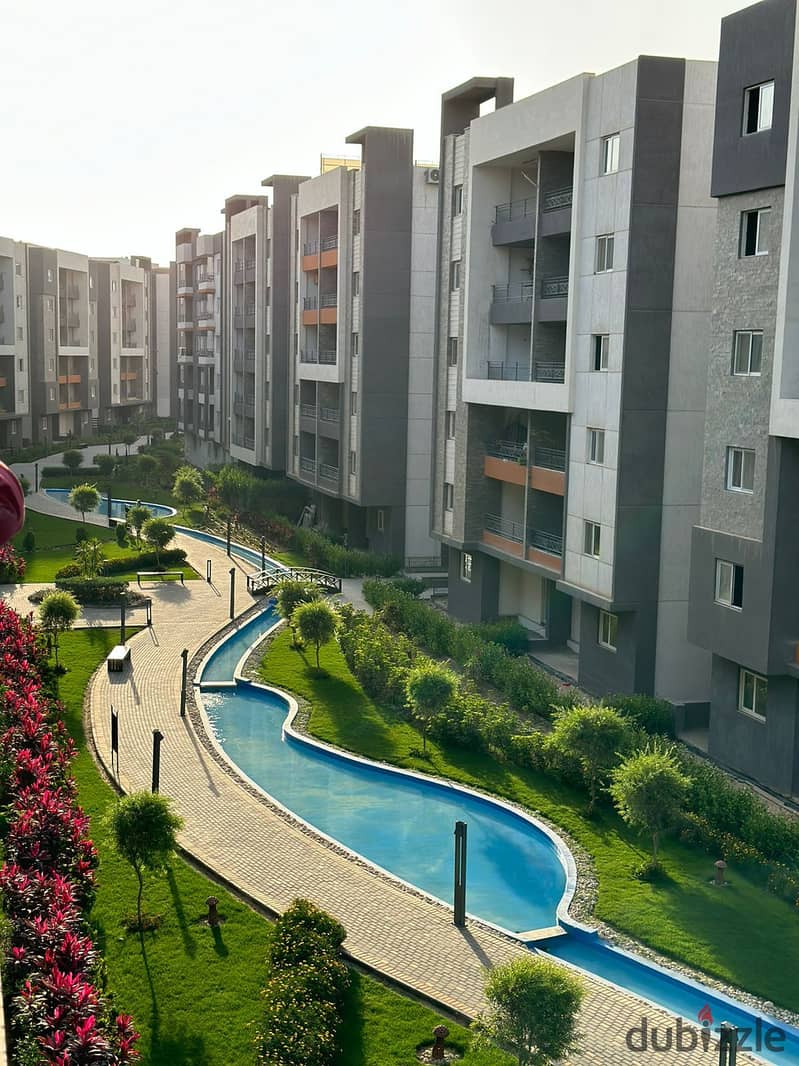 Apartment for sale in October with installments, fully finished in Rock Eden with a distinctive view of water bodies and landscape. . | Ashgar City - A 38