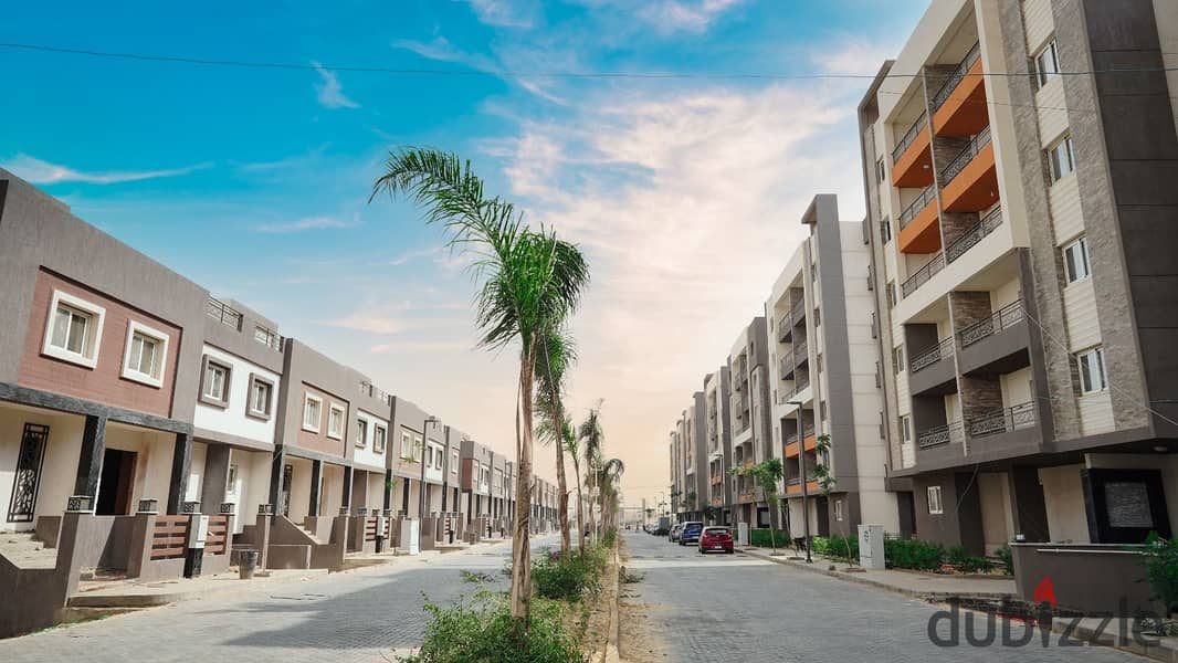 Apartment for sale in installments in October, Bahri face, third floor, with a distinctive view of water bodies and landscape in Rock Eden Compound . . 1