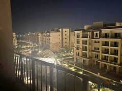 Apartment for sale with a distinctive area a prime location on the Suez Road, beside Madinaty { Sarai Compound } 0