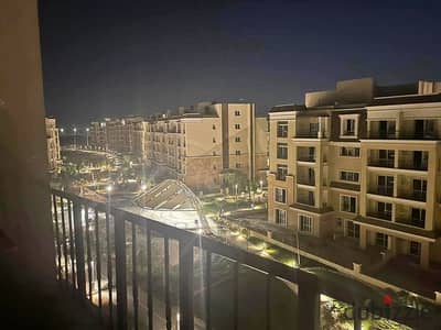 Apartment for sale with a distinctive area a prime location on the Suez Road, beside Madinaty { Sarai Compound }