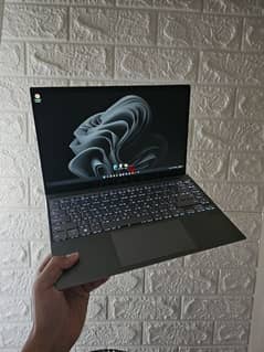 Asus Zenbook 14 (Q408UG) 0